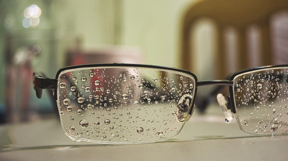 water droplets on black sunglasses