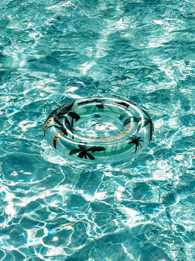 A ring floating in a pool of water